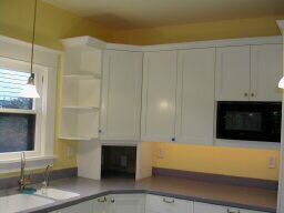 moved door to allow for corner workspace and appliance garage